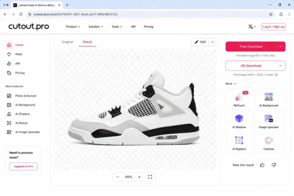 Cutout.pro background removal result screen showing a sneaker cut out on a transparent checkerboard with download and AI editing tools