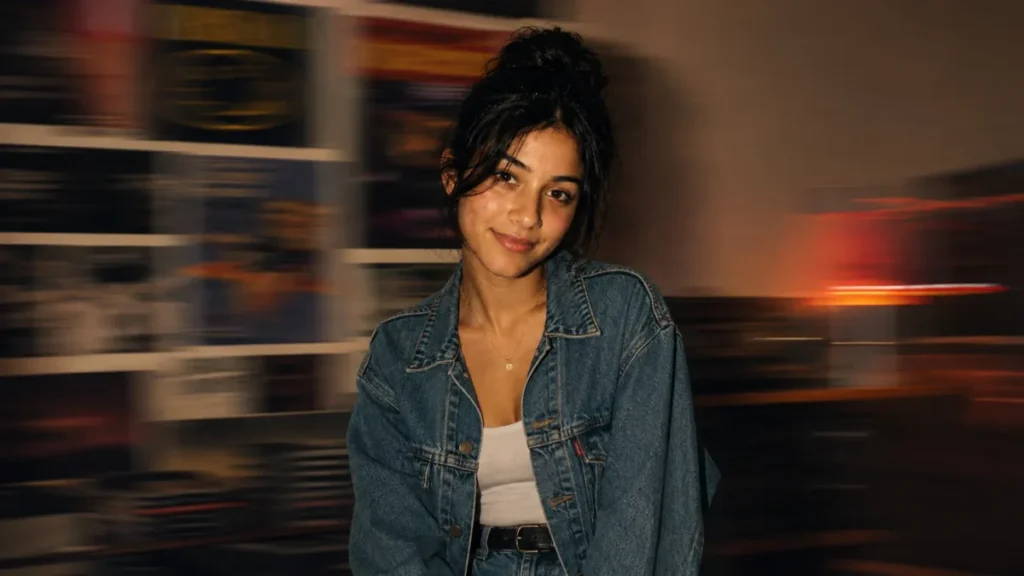 Gemini AI Photo Prompt Copy Paste example showing a sharp portrait subject against a horizontally blurred background with light trails